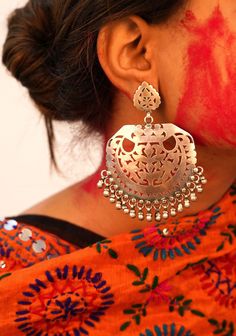 Jhumri Intricate Carved Classic Chandbali Earrings. All our jewellery is handcrafted. Crafted in Oxidized 925 Silver. This piece of art is absolutely extraordinary and requires long involvement with metal handling, and individual devotion for magnificent finishing. Length : 10cm Max width : 6cm 92.5 Silver, Hallmarked Available as a Pair Care tips: Keep jewelry away from hard and rough objects. Store your jewellery in a soft lined box or pouch. This unique designer earring is hand-crafted from solid sterling silver , it is vintage finished and oxidised for ethnic look, a unique work of our craftsmen. Please feel free to contact us anytime regarding any quarries related to our jewelry. We will be pleased to assist you. We are a duo of IIT Roorkee graduate, ex Flipkart and an MBA from Nirma Festive Silver Chandelier Earrings With Tilla, Silver Chandelier Earrings With Tilla For Gifts, Traditional Handmade Sterling Silver Chandelier Earrings, Traditional Sterling Silver Chandelier Earrings With Intricate Design, Traditional Silver Chandelier Earrings For Festive Occasions, Silver Temple Jewelry Chandelier Earrings With Intricate Design, Traditional Oxidized Chandelier Earrings For Festive Occasions, Silver Chandelier Earrings With Intricate Design For Festive Occasions, Festive Handmade Silver Chandelier Earrings