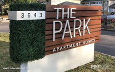 the park apartment homes sign in front of a house