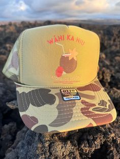 Wahi Ka Niu means break the coconut.  This hat is all aloha Summer Beach Trucker Hat With Flat Brim, Summer Trucker Hat With Flat Brim For Beach, Summer Trucker Hat For The Beach With Flat Brim, Green 5-panel Trucker Hat For Beach, Summer Beach Trucker Hat, 5-panel, Summer Beach Trucker Hat, 5-panel Design, Summer Beach Trucker Hat 5-panel, 5-panel Trucker Hat For Beach Summer, Fun Flat Brim Trucker Hat For The Beach