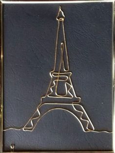 the eiffel tower is engraved on leather