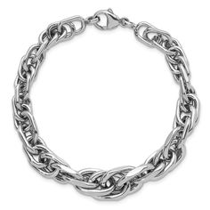 Rhodium over sterling silver graduated link bracelet with polished finish and fancy lobster claw clasp. Measures approximately 7 1/2"L x 3/8"W. Polished Metal Link Jewelry, Polished Oval Link Metal Chain Bracelet, Oval Link Stainless Steel Jewelry With Polished Finish, Sterling Silver Bracelet With Lobster Clasp For Formal Occasions, Oval Link Stainless Steel Bracelets With Polished Finish, Formal Sterling Silver Bracelet With Lobster Clasp, Stainless Steel Oval Link Bracelets With Polished Finish, Modern Jewelry With Lobster Clasp, Polished Stainless Steel Oval Link Bracelets