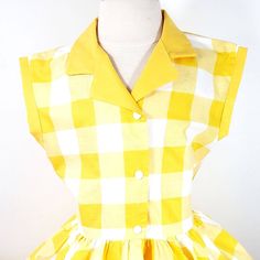 This is an adorable yellow gingham print shirt dress, has a yellow collar and sleeve cuffs. I could also make it out of different fabrics. This dress is shown with an underskirt that can be purchased in my shop for an additional $10. https://www.etsy.com/listing/116097306/tulle-underskirt-made-to-order?ref=shop_home_active Thank you for checking out my listing! Retro Gingham Plaid Cotton Dress, Collared Gingham Dress For Spring, Fitted Cotton Plaid Dress In Preppy Style, Fitted Plaid Cotton Dress In Preppy Style, Preppy Fitted Plaid Cotton Dress, Retro Yellow Dress For Picnic, Collared Gingham Dresses, Classic Gingham Short Sleeve Dress, Summer Cotton Plaid Dress With Buttons