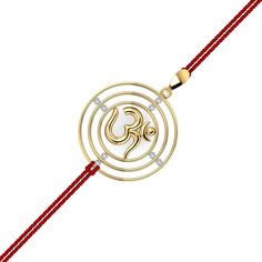 A rakhi (bracelet made of thread, having a solid gold pendant in the center to which the thread is tied) that is made of 18K gold with diamonds. Three concentric circles enclosing the divine Om inside of it. Each of the loops are joined to each other through strategically placed diamonds that act as the connection between adjacent loops. This religious gold rakhi can also be worn as a pendant. Satin threads are provided on either side and it comes in a beautiful gift-ready box along with kumkum- Yellow Gold Bracelet For Festive Gift, Festive Yellow Gold Bracelets For Gifts, 22k Gold Bracelets For Diwali Gift, Symbolic Gold Bracelets For Festivals, Temple Jewelry Style Yellow Gold Bracelets As Gift, Festive Yellow Gold Bracelets For Puja, Yellow Gold Bracelets For Puja And Festive Occasions, Yellow Gold Festive Bracelets For Puja, Traditional Yellow Gold Bracelet As Gift