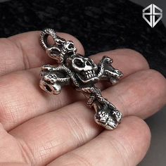 "Material is 925 Sterling Silver. Size is 49mm X 34mm. Chain sizes are up to 3.8mm. This Snake Skull Cross Pendant is just perfect for anyone into tough rugged looking pieces. Nice and beefy with good weight and feel. Great hand carving from start to finish. This pendant is solid 925 sterling silver and is \"not\" plated in any way. Will last a lifetime easily. 1 to 1.5 weeks is are needed to cast your item! Casting by Rainbow. \"We Do Not\" ship to Thailand. Export Only! Thanks." Biker Skull Jewelry For Gift, Biker Style Skull Jewelry For Gift, Biker Style Skull Jewelry Gift, Silver Engraved Jewelry For Biker Events, Biker Style Sterling Silver Jewelry For Biker Events, Silver Skull Biker Jewelry, Biker Silver Skull Jewelry, Celtic Medieval, Snake Skull