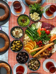 a table topped with lots of different types of food