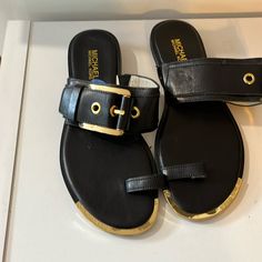 Michael Kors Flat Sandals Adjustable Buckle Across Foot Size 7.5 New, Never Used Smoke-Free Home Black Leather Sandals With Gold-tone Hardware, Michael Kors Flats, London Logo, Michael Kors Sandals, Michael Kors Bedford, Strappy Flats, Rubber Sandals, Leather Mary Janes, Brown Sandals