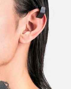 Rick Owens SS24 Lido Prong Ear Cuff in Black. This ear cuff features an engraved logo on the back edge, prong bench inspired and a matte black finish. Craig Green, Boris Bidjan Saberi, Eckhaus Latta, Men Earrings, Engraved Logo, Rick Owens, The Back, Ear Cuff, Matte Black