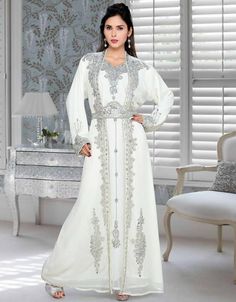 Mashallah! ❤️ Effective Embroidered Full Length Kaftan Dress-White Shop Now : https://bit.ly/3s7MvSP Buy online @ $252.95 #elegantkaftandresses #fancycaftan #fancycaftans #fancykaftan #imagesofkaftan #kaftandesign #kaftandesigns #kaftandressesdubai #kaftanstylemaxidresses #kaftansdesigns #kaptanclothes #khaftandress #ladieskaftandresses #longkaftandresses #kaftanegyptian #kaftansuits #womenkaftans #kaftandresswomen #arabkaftan #arabapparel Dress Modern Elegant, Green Kaftan, Arabic Clothing, Amazing Embroidery, Long Length Dresses, Moroccan Kaftan, Royal Wedding Dress, Islamic Dress, Moroccan Caftan