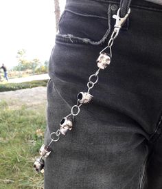 Skull Pants Chain Buckle On The Jeans Pants Aesthetic Accessories Jeans chain Biker Punk Rock Hip Hop Style E Boy Waist Chain !  Material: Steel and Plastic Size: 60 CM Due to the light and screen difference, the item's color may be slightly different from the pictures. Please understand. Make sure you don't mind before you bid. Please allow 10-20mm differences due to manual measurement Estimated time of delivery will also take about 21 to 35 days. Edgy Waist Chain For Festivals, Edgy Metal Chain Belt For Festivals, Silver Punk Chain Belt For Festival, Silver Punk Chain Belt, Edgy Silver Chain Belt For Festival, Edgy Black Chain Belt For Festival, Pants Aesthetic, Skull Pants, Jeans Chain