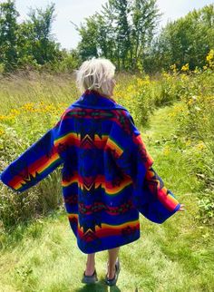 Introducing my latest creation! Reworked a beautiful cobalt blue vintage wool Pendleton blanket into this cozy,  one of a kind blanket coat. Perfect for breezy seaside mornings, autumn hikes, late nights at festivals, and campfires. Complete with double front pockets and toggle closure. Measurements: Overall length: 40" Chest: 62" Shoulder seam to wrist: 23" Oversized unisex design. Can alter sleeve length prior to shipping if needed. Model is 5'10 for reference. 100% wool. Dry clean only. This statement jacket was made with all of my heart, for any human, anywhere, that may be attracted to its vibe! My intention is that the piece will amplify the divine nature of your inner being. ✨🌙 Blanket Lined Denim Jacket, Blanket Jacket Diy, Wool Blanket Anorak, Blanket Coat Pendleton Woolen Mills, Pendelton Blanket Coat, Wool Blanket Coat, Desert Night Sky, Pendleton Coats & Jackets, Desert Night