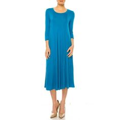 The round neckline adds a classic touch to the dress, while the 3/4 sleeves provide just the right amount of coverage for a stylish and modest look. The sleeves are also versatile, allowing you to wear the dress in different seasons and easily pair it with accessories such as bracelets or a statement necklace. Product Description: This dress is perfect for any occasion where you want to look stylish and comfortable at the same time. The relaxed fit and A-line silhouette provide a flattering and A Line Long Dress, Moa Collection, Look Stylish, Lightweight Fabric, The 3, Casual Dresses For Women, Plus Size Dresses, Round Neckline, The Knee