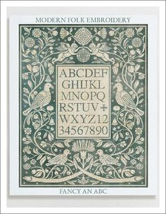 an old fashioned cross stitch pattern in green and white