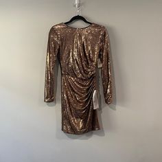 Dress The Population Sequin Dress Size S Color: Copper, Bronze Or Rose Gold Nwt Pit To Pit: 15" Length From Shoulder To Hem: 36" Ruched Dress For Holiday Party, Long Sleeve Ruched Dress For Holiday Party, Ruched Long Sleeve Dress For Holiday Party, Long Sleeve Ruched Holiday Dresses, Ruched Mini Dress For Holiday Party, Fitted Dress For Holiday Party In Fall, Fitted Dress For Fall Holiday Party, Fitted Long Sleeve Holiday Dress, Gold Long Sleeve Dress For Date Night