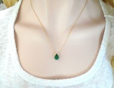 A small Emerald teardrop is hand wrapped on to the sparkle chain, beautiful faceted teardrop emerald is not tiny and attracts attention with the beautiful emerald green teardrop shape. Nice gift for her, gift for mother, May birthstone. Color enhanced natural emerald is approximately 10x7mm  Available in : 14k gold filled (all components) 14k rose gold filled (all components) 925 sterling silver (all components) From the drop down menu: Select the metal finish Select the necklace length you like. Matching Emerald Earring is here: https://www.etsy.com/listing/1124110836/dainty-natural-teardrop-emerald-earrings?ref=listing_published_alert Or message us of what you want us to customize just for you.  A ribbon jewelry box is provide for free ready for gifting, if you like us to hand write a he Green Teardrop Jewelry With Delicate Chain, Green Teardrop Pendant Drop Necklace As Gift, Green Teardrop Pendant Drop Necklace For Gift, Green Teardrop Necklace For May Birthstone, Green Pear-shaped Emerald Necklace Gift, Teardrop Emerald Necklace For Gifting, Green Pear-shaped Drop Necklace For Gift, Green Pear-shaped Drop Necklace Gift, Emerald Drop Necklace As Gift