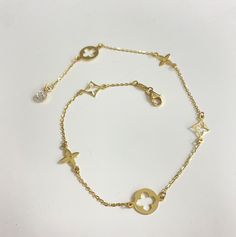 Clovers Ankel Bracelet 14K by Kury - Available at SHOPKURY.COM. Free Shipping on orders over $200. Trusted jewelers since 1965, from San Juan, Puerto Rico. Ankle Bracelets, Flower Designs, Gold Bracelet, Gold Necklace, Yellow Gold, Bracelet, Yellow, 10 Things, Gold