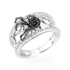 Black Spider Micro Paved CVD Diamonds Ring Made by traditional Italian craftsmanship using top quality CVD Diamond and solid 925 Sterling Silver to last forever. Using top-quality African diamonds as the core of our CVD diamond to achieve timeless radiance and sparkles. Handcrafted to perfection. This ring is made for you, for your loved ones, and the one who loves you. MATERIALS Metal Type: 925 Sterling Silver, Black PlatingMain Stone: CVD Diamond (no certificate)/ Moissanite Diamond comes with Spiderman Noir, Black Skull Ring, Gothic Wedding Rings, Gothic Engagement Ring, Pet Spider, Cvd Diamond, Moissanite Diamond Rings, Pave Diamond Ring, Black Spider