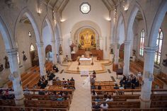 an overhead view of a church with pews and people sitting in the pews