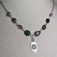 Spiral Charm Necklace With Moss Agate Accent Beads. Measures Approximately 16 Inches Long With A Lobster Clasp And 1.5 Inch Extension Chain. Stone Color And Shape Will Vary As These Are Made To Order Silver Spiral Bohemian Necklace, Bohemian Silver Spiral Necklace, Silver Agate Round Beads Necklace, Silver Agate Necklace With Round Beads, Bohemian Silver Agate Beaded Necklace, Handmade Silver Agate Beaded Necklaces, Silver Agate Crystal Necklace With Gemstone Beads, Silver Agate Crystal Necklace With Natural Stones, Silver Beaded Agate Necklaces With Natural Stones