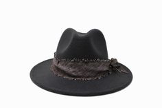 The Santiago Hat from the San Miguel Collection One Size Design- With a tie of a knot, adjust the fit of your hat to the ideal size. 21 ¼ to 23 ¼ inches. Color: Smokey Grey Madapolam Cotton Hatband Natural Golden Black Striped Pheasant Feather Fabric: 65% Cotton, 35% Polyester We take pride in hand crafted goods & natures unique imperfections. No two hats are the same. Casual Adjustable Panama Hat For Winter, Winter Casual Adjustable Panama Hat, Casual Adjustable Wide Brim Top Hat, Winter Adjustable Fedora Panama Hat, Adjustable Casual Felt Hat For Kentucky Derby, Adjustable Felt Cap For Kentucky Derby, Grey Fedora Hat, Grey Fedora, Feather Fabric