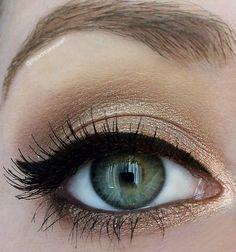 Gold shadow with winged liner