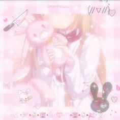 a girl holding a pink teddy bear in her arms with hearts around her neck and the words chermuluu written on it