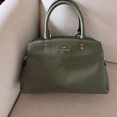 Nice Size, 10” X 7” Zippered Opening With Two Snap Pockets On Either Side Of The Zippered Opening. Very Limited Use And In Excellent Condition. Classic Green Satchel With Handles, Coach Satchel With Zipper Closure, Green Rectangular Coach Bags, Green Coach Bag With Detachable Strap, Coach Green Bags With Detachable Strap, Classic Green Handheld Satchel, Green Coach Satchel With Top Carry Handle, Green Coach Bag With Zipper Closure, Green Coach Shoulder Bag For Travel