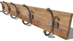 a wooden coat rack with four hooks on it