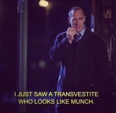 a man standing in front of a mirror talking on a cell phone with the caption, i just saw a transvesite who looks like munch