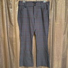 Torrid Gray Plaid Ponte Stretchy Trouser Office Work Pants Size 16 Nwt Brand New With Tags, Smoke And Pet Free Home. Size 16 Regular Length. No Flaws At All. These Do Have Somewhat Of A Bootcut To Them. Super Stretchy And Comfortably, If I Had An Office Or Business Casual Job I Would Love To Add These Cute Pants Into My Wardrobe! Back Pockets Are Sewn. Button/Zip Fly. No Longer Sold Online. Rayon/Nylon/Spandex. These Feel Nice, Not Cheap Or Thin. Retails For $70. Plaid Pattern Has A Little Splash Of Pink In There Too. Waist Laying Flat Across Approx 18.75” Rise 11” Inseam 33” Leg Opening Flat Across 9.5” Cute Pants, My Wardrobe, Jumpsuit Trousers, Gray Plaid, Office Work, Work Pants, Selling Online, Plaid Pattern, Business Casual