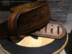 a wooden belt sitting on top of a table