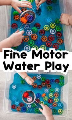 kids playing with fine motor water play on the floor and in an ice tray that is filled with plastic cups