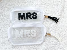 This clear zipper pouch is a waterproof bag that is perfect for organizing and storing cosmetics, jewelry, or travel supplies. The transparent design allows you to see everything easily! Each bag features a beaded MRS in white or black with a matching tassel on the zipper.  Measures approximately 6.5 x 4.7 x 2.3 (L x H x W) inches ♥ VIEW MORE MAKEUP BAGS ♥ https://www.etsy.com/shop/leemorgandesigns?section_id=22911219 ♥ VISIT THE MAIN SHOP PAGE ♥ https://www.etsy.com/shop/leemorgandesigns Lee Morgan Designs LLC, 2018 Thank you for visiting my shop! Find me on social media Facebook: https://www.facebook.com/leemorgandesigns/ Instagram: https://www.instagram.com/leemorgandesigns/ Clear Zipper Pouch, Lee Morgan, Travel Supplies, Waterproof Bag, Waterproof Bags, Transparent Design, Makeup Bags, Toiletry Storage, Zip Pouch