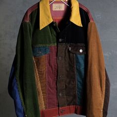 Rare Only 300 Made The Type 3 Cord Trucker In Mash-Up Is A Corduroy Trucker Made From Eleven Different Found Off-Cuts Of Corduroy Fabric. This Was The Last Of It, And There Was Only Enough For 300 Jackets. Levi's Vintage Clothing Embrace Season’s Past With A Mash-Up Of Colorful Corduroy. Dressed In The Velvety Fabric With Retro Colours Reigning Throughout, The Updated Trucker Silhouette Hosts A Classic Button Closure And Chest Pockets; Undeniably Levi’s With Its Brand Tab Sitting Front And Centre. Style #560430000 Size Medium Chest Pit To Pit: 21.5 Inches Length: 24-24.5 Inches Arm Length: 26 Inches Composition & Care * 100% Cotton * Non-Stretch Corduroy * Wash And Dry Inside Out With Corduroy Patchwork, Retro Colours, Colorblock Jacket, Levis Vintage Clothing, Color Block Jacket, Corduroy Fabric, Swaggy Outfits, Moda Vintage, Trucker Jacket