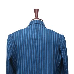 This Chiragh Apparel blazer is an elegant upgrade on dapper tailoring and features rich shades in a sumptuous fabric for elegant opulence. Fashioned from premium quality wool, this striped blazer features full lining in Japanese silk, a notch lapel, two-button closure and single-vented back. A left chest pocket and three flap pockets appoint the front while the inside has two (2) pockets on the left and one (1) pocket on the right. A flash of contrast piping is added to the jacket lining inside. Formal Blue Blazer With Suit Collar, Formal Tailored Blue Blazer, Blue Suits With Notch Lapel And Hidden Button Closure, Tailored Blue Blazer For Formal Occasions, Blue Formal Blazer With Welt Pockets, Formal Blue Blazer With Welt Pockets, Blue Tailored Blazer For Formal Occasions, Business Blue Blazer With Suit Collar, Elegant Blue Suits With Button Closure