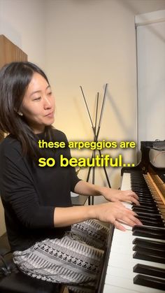 a woman sitting at a piano with the words, these appregios are so beautiful