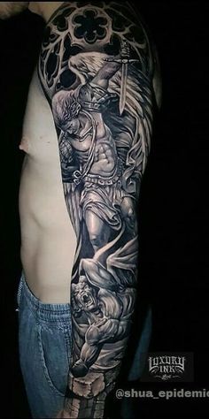 a man's half sleeve with an angel and demon tattoo on his left arm