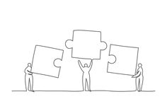 three people holding up puzzle pieces together