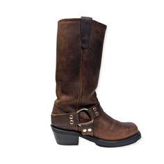 These Double H Tall Brown Leather Boots Are The Perfect Blend Of Rugged Durability And Classic Western Style. Designed With A Square Toe, These Boots Offer Both Comfort And A Modern Look, Making Them A Versatile Addition To Any Wardrobe. Crafted From High-Quality Leather, They Boast A Rich Brown Finish That Only Gets Better With Time. Available In A Men's Size 6 Or Women's Size 7.5, These Boots Are Made To Fit Perfectly And Provide Lasting Comfort. Whether You're Hitting The Trails Or Heading Ou Bridle Leather Boots With Round Toe And Leather Lining, Leather Moto Boots With Steel Toe And Round Toe, Leather Moto Boots With Steel Toe, Leather Steel Toe Boots, Rugged Closed Toe Boots With Leather Lining, Leather Moto Boots With Steel Toe And Snip Shape, Western Boots With Bridle Leather And Round Toe, Rugged Leather Moto Boots With Almond Toe, Western Bridle Leather Boots With Round Toe