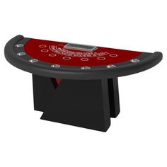 a black and red poker table sitting on top of a white floor with an electronic device in the middle