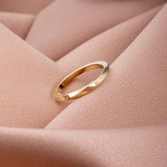 Twisted Wedding Band Ring for Women 14K Solid Gold Mobius - Minimalist Stacking Gold Ring A handmade wedding ring of 14k solid gold with softened edges for comfort. Engrave the ring with no extra cost. 100% handcrafted with love! D E T A I L S ● Metal: 14K solid gold, 14K white gold, 14K rose gold ● Dimensions: measures 2.1 mm in width x 2.2mm thick R I N G ∙ S I Z I N G For General Reference: ● we use standard US Ring Sizing ● an average women's ring finger is size 6-7 and an average men's ring Twisted Wedding Band, Twist Wedding Band, Handmade Wedding Rings, Gold Ring Stack, Wedding Band Ring, Men's Ring, Handmade Wedding, Ring Finger, Ring For Women