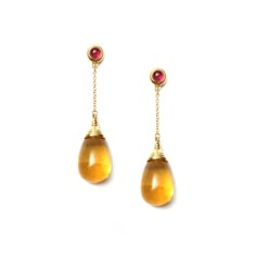 18 karat yellow gold Gemstone drops 20 carats plus Rubellite tops 1 carat approx. Post backs for pierced ears Formal Drop Cabochon Earrings, Yellow Gold Briolette Citrine Earrings, Yellow Gold Citrine Dangle Earrings, Luxury Yellow Teardrop Earrings, Luxury Amber Drop Earrings, Hallmarked Drop Earrings, Formal Yellow 14k Gold Earrings, Yellow Briolette Earrings For Formal Occasions, Elegant Yellow Long Drop Jewelry