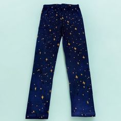 These Stars Print Pants Are A Stylish And Comfortable Addition To Any Wardrobe. The Pants Feature A Unique And Eye-Catching Design With A Combination Of Navy Blue And Yellow Colors, Along With A Touch Of Black. The Stars Pattern Adds A Playful And Feminine Touch To The Outfit. These Pants Are Perfect For Casual Wear Or As A Statement Piece For A More Formal Occasion. The Stretchy Fabric Ensures A Comfortable Fit, Making Them Suitable For Various Body Types And Occasions. Pair Them With A Matchin Star Pj Pants, Star Pjs, Star Print Pants, Navy Blue And Yellow, Stars Pattern, Cute Leggings, Stretchy Leggings, Pj Pants, Blue Stars