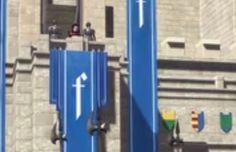 two people standing on the top of some tall blue doors with arrows pointing in different directions