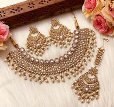 Gorgeous Sabyasachi tyaanai inspired Mirror Choker that is high in demand for the wedding season comes with matching earrings and tikka. The bollywood style modern choker is like a necklace that falls right under the neck and is very versatile. There is an adjustable drawstring that makes the necklace adjustable according to preference and the tikka and jhumka can be work seperately as well. Lightweight shisha work along with beads to add a pop of bright color. Free Shipping and Fast shipping - Maang Tikka Bridal, Indian Wedding Jewelry Sets, Beautiful Chokers, Fancy Jewellery Designs, Maang Tikka, Jewelry Mirror, Indian Necklace, Bollywood Style, Bollywood Jewelry