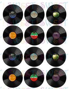 twelve vinyl records with different colored labels and numbers on the side, all in black