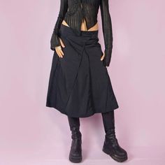 The Y2K Subversive Black Midi Skirt is a vintage 2000s godet circle skirt featuring a back zipper closure. With its elegant and formal design, it's perfect for parties and night-out events. ESTIMATED SIZE L TAG SIZE EUR 40 MEASUREMENTS Length 68cm - 26.77 inch Waist 80cm - 31.49 inch Our model is 172 cm tall and usually wears size XS. Please be aware that some items may be slightly pinned on the model to demonstrate the correct fit. We ship worldwide from Spain and offer free shipping on all ord Y2k Subversive, Vintage Midi Skirt, Godet Skirt, Midi Skirt Black, Formal Design, Black Circle, Skirt Y2k, Black Midi Skirt, Black Midi