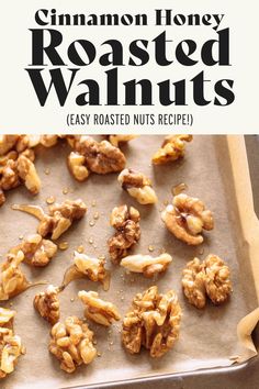 cinnamon honey roasted walnuts on a baking sheet with the words easy roasted nuts recipe