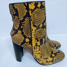 Aqua Soren Brown Leather Ankle Boots Multi Color Shoes 8m Black And Yellow Ankle Booties Heel About 4’ Side Zipper Animal Printed Boots Size 8 Leather New Without Box Yellow High Heel Shoes For Fall, Yellow High Heel Boots For Spring, Yellow High Heel Boots For Fall, Yellow High Heel Heels For Fall, Spring Yellow High Heel Boots, Yellow High Heels For Fall, Yellow Round Toe Heels For Fall, Trendy Yellow Boots For Fall, Bold Leather Heels For Fall