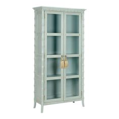 a white cabinet with glass doors and drawers