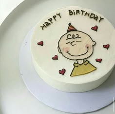 a birthday cake with a cartoon character on it